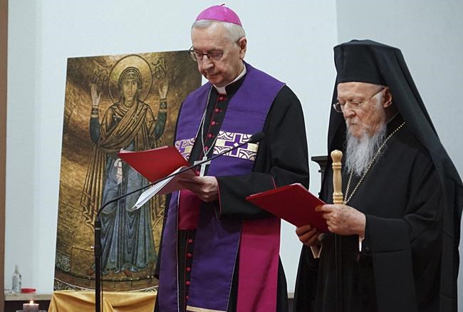 The spiritual leader of the world's Orthodox Christians, Ecumenical Patriarch Bartholomew I, right, and Archbishop Stanisław Gądecki, the head of the Polish Bishops' Conference, stand together as they meet with Ukrainian refugees in Warsaw, Poland, on March 29, 2022. Bartholomew denounced Russia's invasion of Ukraine as an