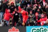 Canada's Tajon Buchanan does a backflip after scoring against Jamaica during first half CONCACAF World Cup soccer qualifying action in Toronto on Sunday, March 27, 2022. While some soccer fans in Canada are feeling elation over the country's World Cup qualification, others are less certain where their allegiances will lie when the showcase tournament kicks off this year. THE CANADIAN PRESS/Frank Gunn