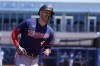 Minnesota Twins shortstop Carlos Correa rounds third after a solo home run in the fourth inning during a spring training baseball game against the Tampa Bay Rays at the Charlotte Sports Park Tuesday March 29, 2022, in Port Charlotte, Fla. (AP Photo/Steve Helber)