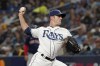 FILE -Tampa Bay Rays relief pitcher David Robertson throws to a Boston Red Sox batter during the sixth inning of Game 2 of a baseball American League Division Series, Friday, Oct. 8, 2021, in St. Petersburg, Fla. Robertson finalized a $3.5 million, one-year contract with Chicago on March 16. He can earn an additional $500,000 in performance bonuses and $1 million in roster bonuses. (AP Photo/Steve Helber, File)