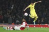 Liverpool's Luis Diaz, right, and Arsenal's Gabriel compete for the ball during the English Premier League soccer match between Arsenal and Liverpool at Emirates Stadium in London, Wednesday, March 16, 2022. (AP Photo/Ian Walton)