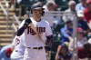 Minnesota Twins shortstop Carlos Correa prepares to bat in the fourth inning during a spring training baseball game against the Boston Red Sox at Hammond Stadium Sunday, March 27, 2022, in Fort Myers, Fla. (AP Photo/Steve Helber)