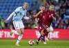 Norway's Erling Braut Haaland, left, and Armenia's Varazdat Haroyan battle for the ball during the international friendly soccer match between Norway and Armenia at Ullevaal Stadium in Oslo, Tuesday March 29, 2022. (Hakon Mosvold Larsen/NTB via AP)