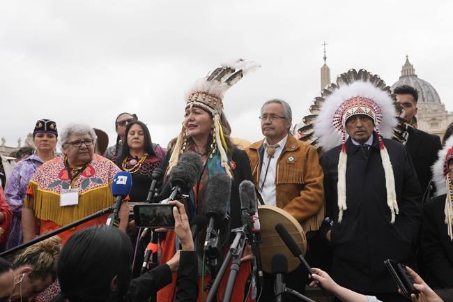 Assembly of First Nations member Rosanne Casimiro Ttes talks to journalists outside St. Peter's Square at the end of a meeting with Pope Francis at the Vatican, Thursday, March 31, 2022. (AP Photo/Andrew Medichini)