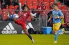 Toronto FC midfielder Jahkeele Marshall-Rutty (7) stretches to control the ball as he is defended by Philadelphia Union defender Kai Wagner (27) during second half MLS action in Toronto on Wednesday, October 27, 2021.&nbsp;Toronto FC fullback Jahkeele Marshall-Rutty is scheduled undergo a procedure on his knee after a second scan turned up different results than the first. THE CANADIAN PRESS/Evan Buhler