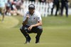 Corey Conners lines up his putt on the 18th hole in the semifinal round of the Dell Technologies Match Play Championship golf tournament, Sunday, March 27, 2022, in Austin, Texas. THE CANADIAN PRESS/AP-Tony Gutierrez