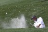 Ryan Palmer hits out of a bunker on the first day of play at the Valero Texas Open at TPC San Antonio, Thursday, March 31, 2022. (Jerry Lara/The San Antonio Express-News via AP)