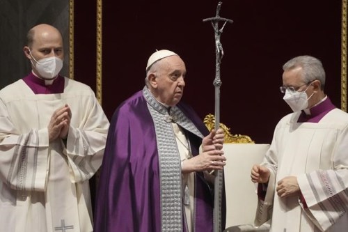 FILE- Pope Francis presides over a special prayer in St. Peter's Basilica at the Vatican, Friday, March 25, 2022. Pope Francis heads to Malta on April 2, 2022 with the refugee exodus from Ukraine casting a haunting backdrop to a migration drama that for years has focused on Malta and the plight of desperate people who arrive there seeking shelter in Europe. (AP Photo/Gregorio Borgia, File)