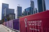 A view of the fence around the Doha Exhibition and Convention Center where soccer World Cup draw will be held, in Doha, Qatar, Thursday, March 31, 2022. The final draw will be held on April 1. (AP Photo/Darko Bandic)