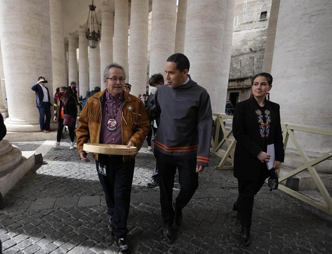 From left, Gerald Antoine, First Nations NWT Regional Chief, Natan Obed, President of Inuit Tapiriit Kanatami delegation, and Cassidy Caron, President of the Metis community, walk in St. Peter's Square, at the Vatican, after their meeting with Pope Francis, Friday, April 1, 2022. Pope Francis on Friday made a historic apology to Indigenous Peoples for the