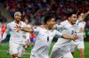 Uruguay's Luis Suarez, center, celebrates scoring his side's opening goal against Chile during a qualifying soccer match for the FIFA World Cup Qatar 2022 at San Carlos de Apoquindo stadium in Santiago, Chile, Tuesday, March 29, 2022. (Alberto Valdes/Pool Via AP)