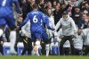 Chelsea's Antonio Rudiger celebrates with head coach Thomas Tuchelafter after scoring his side's first goal during the English Premier League soccer match between Chelsea and Brentford, at the Stamford Bridge stadium in London, Saturday, April 2, 2022. (AP Photo/Ian Walton)