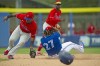 Toronto Blue Jays first baseman Vladimir Guerrero Jr. loses his helmet and covers his head while successfully stealing second during a spring training game at TD Ballpark, in Dunedin, Fla., Saturday, April 2, 2022. THE CANADIAN PRESS/Mark Taylor