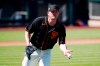 San Francisco Giants relief pitcher Jake McGee flips the ball to first base to get Arizona Diamondbacks' Matt Davidson out during the fouth inning of a spring training baseball game Wednesday, March 23, 2022, in Scottsdale, Ariz. (AP Photo/Ross D. Franklin)