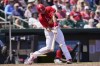 St. Louis Cardinals' Paul Goldschmidt singles in the fifth inning of a spring training baseball game against the Washington Nationals, Friday, March 25, 2022, in Jupiter, Fla. (AP Photo/Sue Ogrocki)