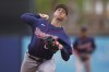 Minnesota Twins pitcher Griffin Jax delivers in the ninth inning during a spring training baseball game against the Tampa Bay Rays, Saturday April 2, 2022, in Port Charlotte, Fla. (AP Photo/Steve Helber)