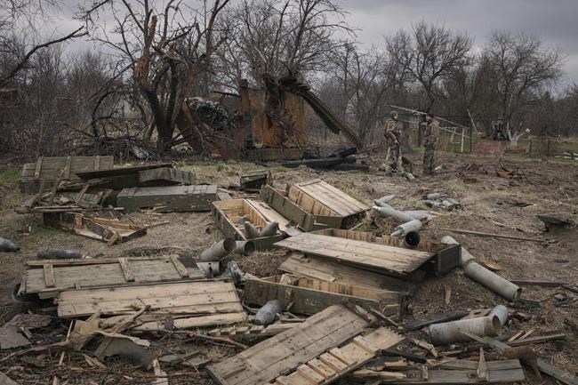 Ammunition abandoned by retreating Russian forces or retrieved from destroyed fighting vehicles lies on the ground in the village of Andriivka, Ukraine, heavily affected by fighting between Russian and Ukrainian forces, Wednesday, April 6, 2022. Several buildings in the village were reduced to mounds of bricks and corrugated metal and residents struggle without heat, electricity or cooking gas. (AP Photo/Vadim Ghirda)