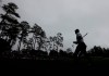Tiger Woods walks to the 14th tee during his morning practice round for the Masters at Augusta National Golf Club in Augusta, Ga., Wednesday, April 6, 2022. (Curtis Compton/Atlanta Journal-Constitution via AP)