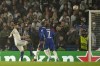 Real Madrid's Karim Benzema, left, heads the ball to score his side's second goal during a Champions League first-leg quarterfinal soccer match between Chelsea and Real Madrid at Stamford Bridge stadium in London, Wednesday, April 6, 2022. (AP Photo/Kirsty Wigglesworth)