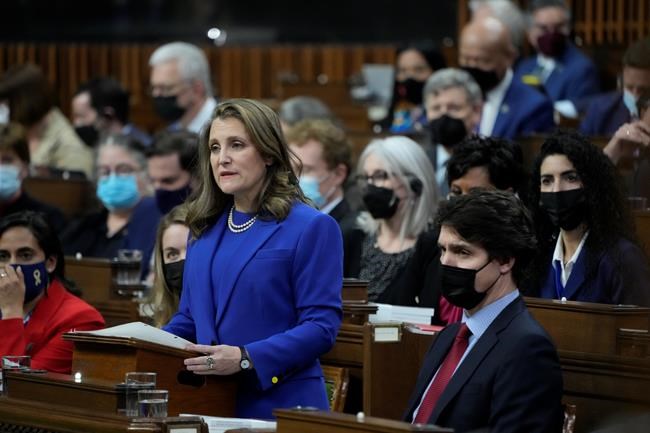 Finance Minister Chrystia Freeland tables the federal budget in the House of Commons in Ottawa, Thursday, April 7, 2022. The federal Liberal government hopes to ease the housing crisis with more than $10 billion in funding meant to speed up home construction and repairs. The commitments are part of a raft of promises in the federal budget unveiled Thursday that also include a two-year ban on foreign investors buying homes and tax measures meant to reduce speculation.THE CANADIAN PRESS/Adrian Wyld