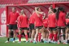 Canada's women's national soccer team captain Christine Sinclair, left, takes a break during team practice ahead of two friendly matches against Nigeria, in Vancouver, B.C., Thursday, April 7, 2022. THE CANADIAN PRESS/Darryl Dyck