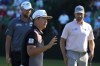 Sungjae Im, of South Korea, waves after a birdie on the 15th hole during the first round at the Masters golf tournament on Thursday, April 7, 2022, in Augusta, Ga. (AP Photo/Charlie Riedel)