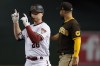 Arizona Diamondbacks' Pavin Smith (26) celebrates his base hit against the San Diego Padres during the seventh inning of a baseball game, Thursday, April 7, 2022, in Phoenix. (AP Photo/Matt York)