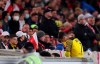 Dortmund's Giovanni Reyna walks off the pitch following an injury during the German Bundesliga soccer match between Dortmund and VfB Stuttgart, at the Mercedes-Benz Arena in Stuttgart, Germany, Friday, April 8, 2022. (Tom Weller/dpa via AP)