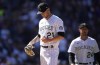 Colorado Rockies starting pitcher Kyle Freeland waits to be pulled from the mound after giving up a walk to Los Angeles Dodgers' Freddie Freeman in the fourth inning of a baseball game Friday, April 8, 2022, in Denver. (AP Photo/David Zalubowski)