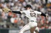 San Francisco Giants' Logan Webb pitches against the Miami Marlins during the first inning of a baseball game in San Francisco, Friday, April 8, 2022. (AP Photo/Eric Risberg)