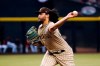 San Diego Padres starting pitcher Sean Manaea throws against the Arizona Diamondbacks during the first inning of a baseball game Friday, April 8, 2022, in Phoenix. (AP Photo/Ross D. Franklin)