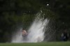 Scottie Scheffler hits out of a bunker on the 17th hole during the second round at the Masters golf tournament on Friday, April 8, 2022, in Augusta, Ga. (AP Photo/Jae C. Hong)