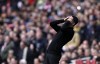 Arsenal's manager Mikel Arteta reacts during the English Premier League soccer match between Arsenal and Brighton and Hove Albion at Emirates stadium in London, Saturday, April 9, 2022. (AP Photo/Ian Walton)