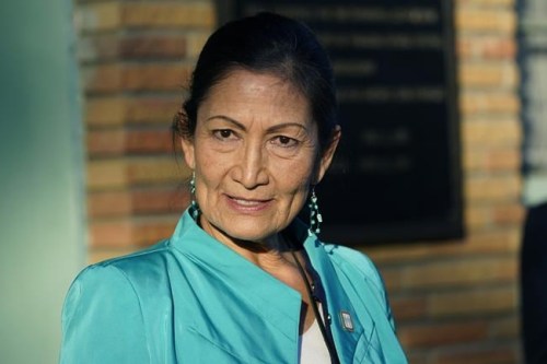 Interior Secretary Deb Haaland speaks with reporters while standing outside the Medgar and Myrlie Evers Home National Monument in Jackson, Miss., on Feb. 15, 2022. On the heels of a historic moment of healing for Indigenous Peoples in Canada, their counterparts in the United States await a federal report on residential schools — commissioned by Haaland, the first-ever Indigenous member of cabinet — that’s fuelling hope for the start of a similar reckoning. THE CANADIAN PRESS/AP-Rogelio V. Solis