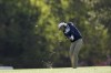 Cameron Smith, of Australia, hits on the 14th fairway during the third round at the Masters golf tournament on Saturday, April 9, 2022, in Augusta, Ga. (AP Photo/Robert F. Bukaty)