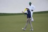 Cameron Smith, of Australia, waves after a birdie putt on the sixth hole during the third round at the Masters golf tournament on Saturday, April 9, 2022, in Augusta, Ga. (AP Photo/David J. Phillip)