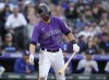 Colorado Rockies' Kris Bryant reacts after striking out against Los Angeles Dodgers starting pitcher Tony Gonsolin to end the second inning of a baseball game Saturday, April 9, 2022, in Denver. (AP Photo/David Zalubowski)