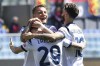 Lazio's Ciro Immobile, center, celebrates with teammates after scoring his side's second goal during the Italian Serie A soccer match between Genoa and Lazio at the Luigi Ferraris stadium in Genoa, Sunday, April 10, 2022. (Tano Pecoraro/LaPresse via AP)