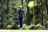 Scottie Scheffler reacts to making a birdie on the third hole during the final round of the Masters golf tournament, Sunday, April 10, 2022, in Augusta, Ga. (Hyosub Shin/Atlanta Journal-Constitution via AP)