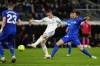 Real Madrid's Gareth Bale, left, vies for the ball with Getafe's Okay Yokuslu during the Spanish La Liga soccer match between Real Madrid and Getafe at the Santiago Bernabeu stadium in Madrid, Saturday, April 9, 2022. Real Madrid won 2-0. (AP Photo/Manu Fernandez)