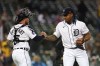 Detroit Tigers catcher Tucker Barnhart and pitcher Gregory Soto celebrate after beating the Boston Red Sox 3-1 in a baseball game in Detroit, Monday, April 11, 2022. (AP Photo/Paul Sancya)