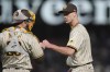 San Diego Padres catcher Austin Nola, left, celebrates with pitcher Taylor Rogers after the Padres defeated the San Francisco Giants in a baseball game in San Francisco, Monday, April 11, 2022. (AP Photo/Jeff Chiu)
