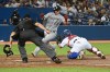Chicago White Sox’s Zack Collins (21) is tagged out at home by Toronto Blue Jays’ catcher Alejandro Kirk, right, in the eighth inning of an American League baseball game in Toronto on Tuesday, Aug. 24, 2021. THE CANADIAN PRESS/Jon Blacker