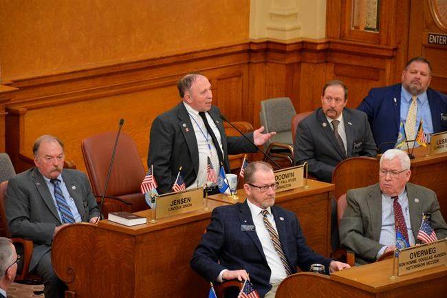 Republican state Rep. Will Mortenson talks to the South Dakota House members during the impeachment hearing for Attorney General Jason Ravnsborg, Tuesday, April 12, 2022, in Pierre, S.D. Mortenson drew up the articles of impeachment for Ravnsborg, who struck and killed a man with his vehicle in 2020. The House voted 36-31 to impeach Ravnsborg. (Jorge Encinas/Pierre Capital Journal via AP)