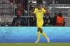Villarreal's Samuel Chukwueze celebrates after scoring his side's opening goal during the Champions League, second leg, quarterfinal soccer match between Bayern Munich and Villareal at the Allianz Arena, in Munich, Germany, Tuesday, April 12, 2022. (AP Photo/Matthias Schrader)