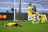 Chelsea players react at the end of the Champions League, quarterfinal second leg soccer match between Real Madrid and Chelsea at the Santiago Bernabeu stadium in Madrid, Spain, Tuesday, April 12, 2022. (AP Photo/Manu Fernandez)