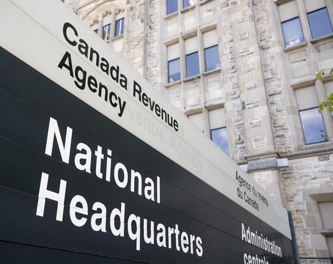 A sign outside the Canada Revenue Agency is seen Monday May 10, 2021 in Ottawa. Canada's largest grassroots Muslim organization is asking a court to halt a federal audit of its activities as a registered charity, alleging the probe is discriminatory and violates its charter rights. THE CANADIAN PRESS/Adrian Wyld