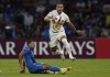 Nicolas Freire of Mexico's Pumas, top, and Ivan Morales of Mexico's Cruz Azul battle for the ball during a CONCACAF Champions League soccer match in Mexico City, Tuesday, April 12, 2022. (AP Photo/Eduardo Verdugo)