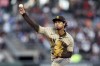 San Diego Padres' Yu Darvish pitches against the San Francisco Giants during the first inning of a baseball game in San Francisco, Tuesday, April 12, 2022. (AP Photo/Jed Jacobsohn)