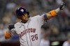 Houston Astros' Jose Siri crosses the plate after hitting a solo home run against the Arizona Diamondbacks during the fifth inning of a baseball game, Tuesday, April 12, 2022, in Phoenix. (AP Photo/Matt York)